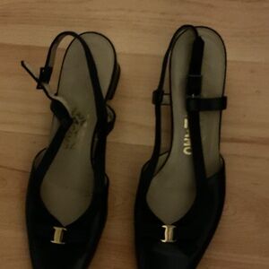 Salvatore Ferragamo Black and Gold Slingback Loafers